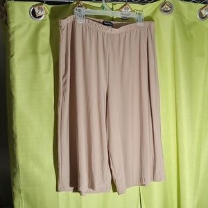 1X shorts. Tan, longer, flowy. Comfort